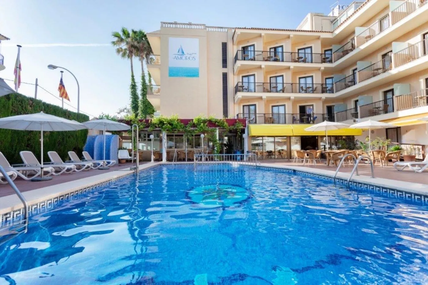 Hotel Amoros outdoor pool and facade