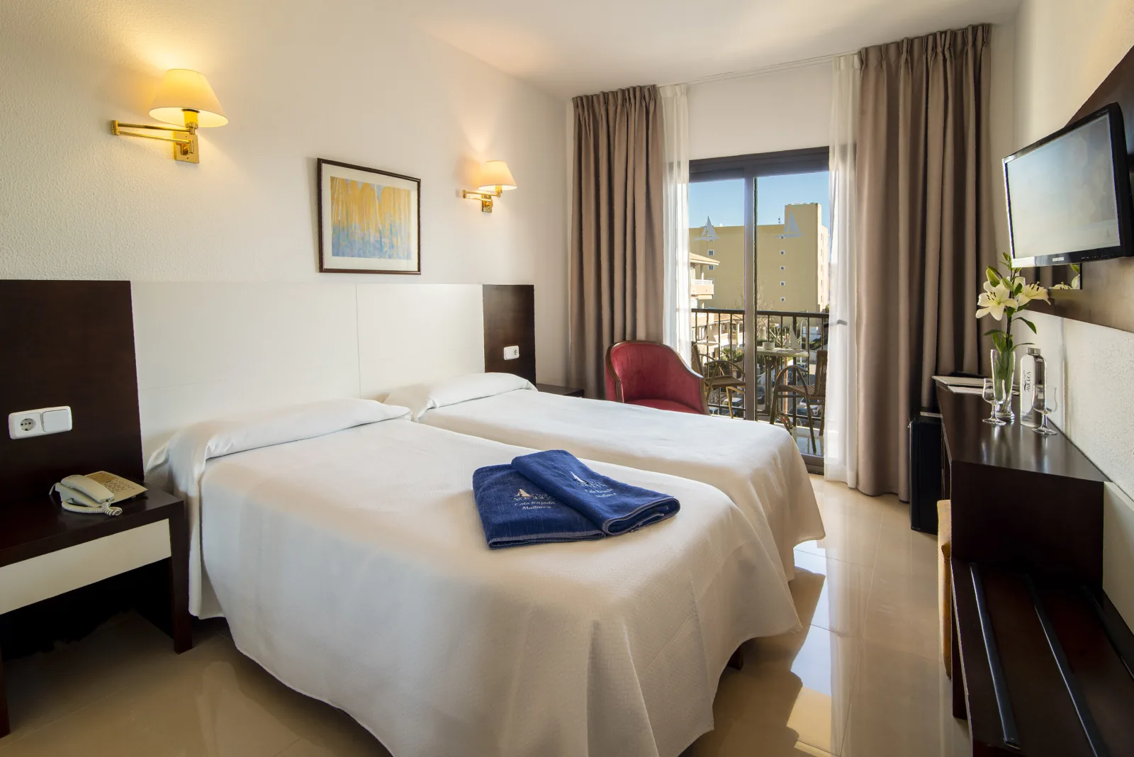 Bright guest room at Hotel Amoros